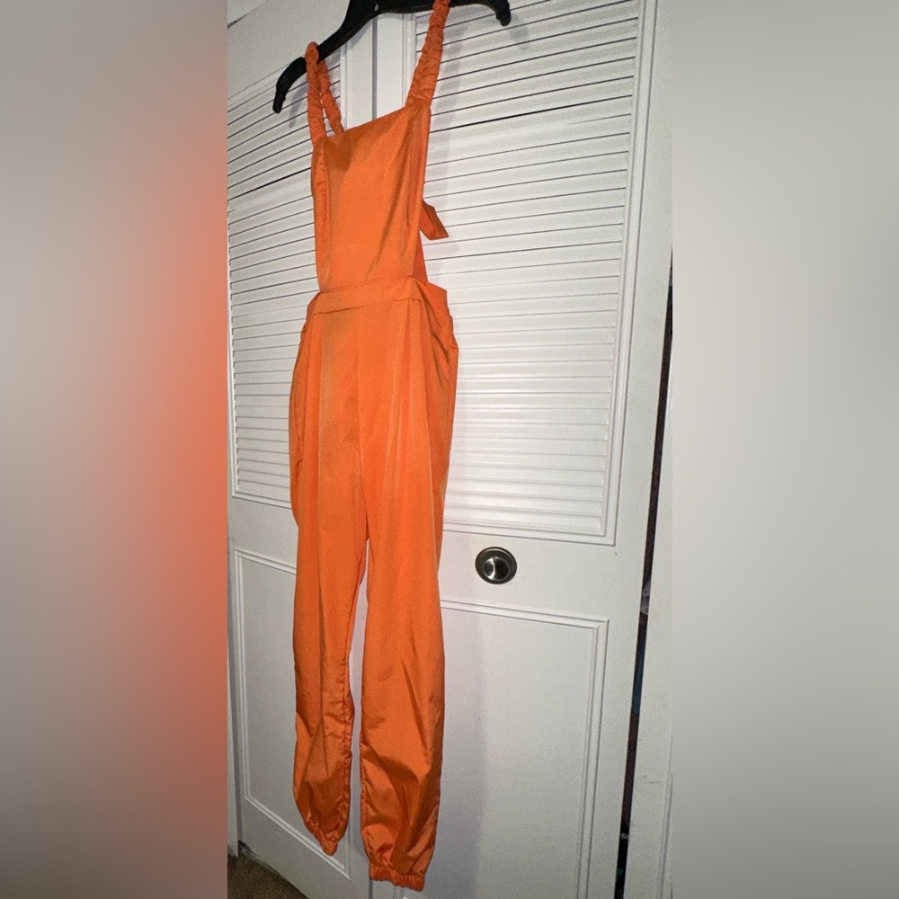 NWOT!!!! Orange Boutique Jumpsuit
